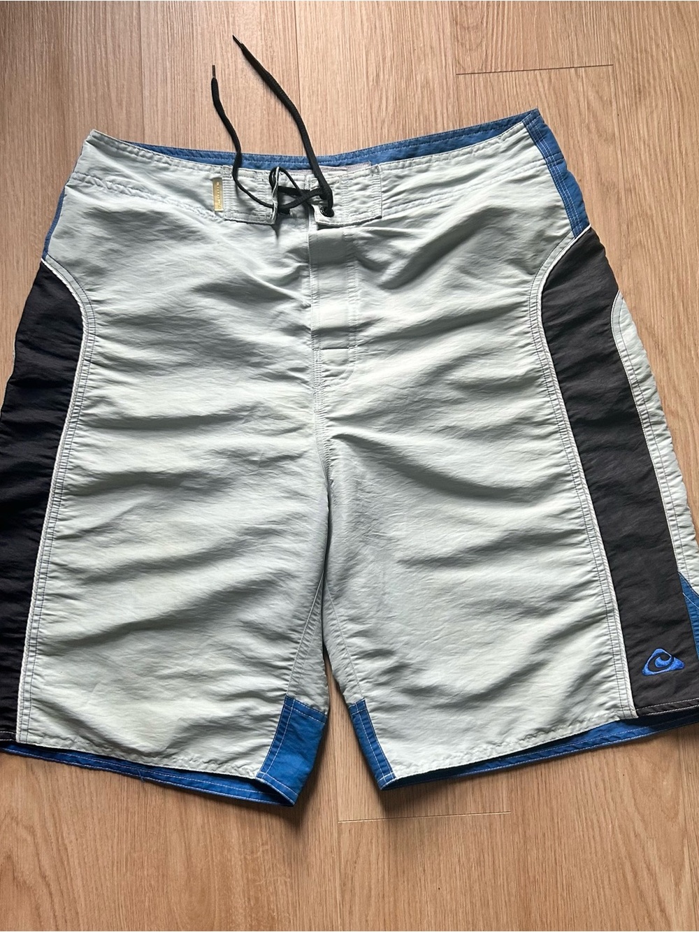Men's Light Gray & Black Swim Trunks with Blue Accents